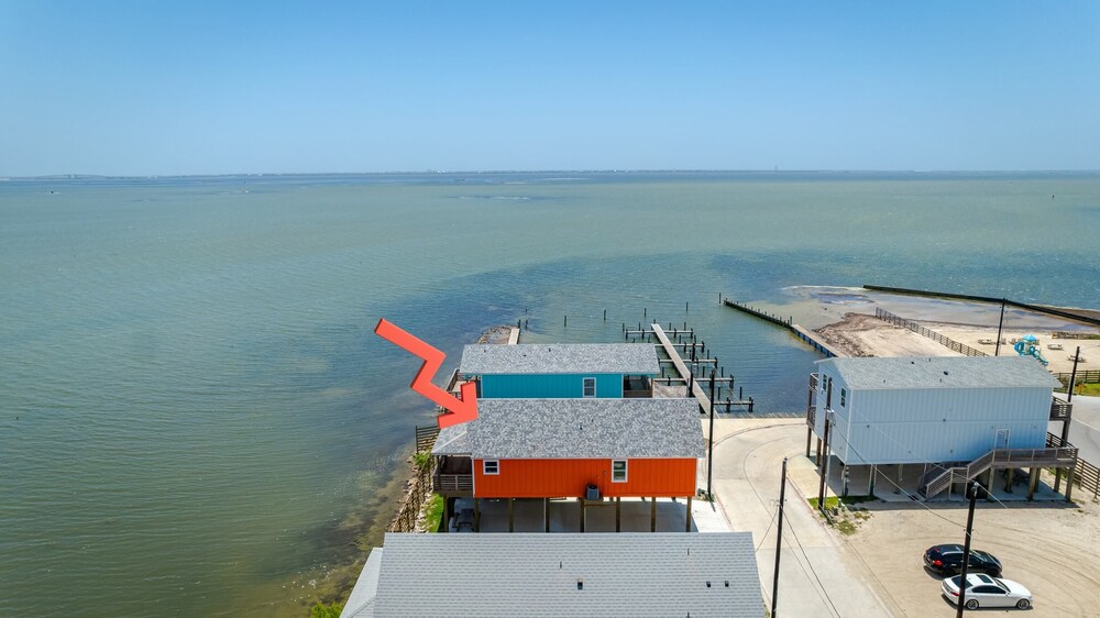 Waterfront Escape w/ Views Shared Pool & Boat Dock Orange Crush by Avantstay