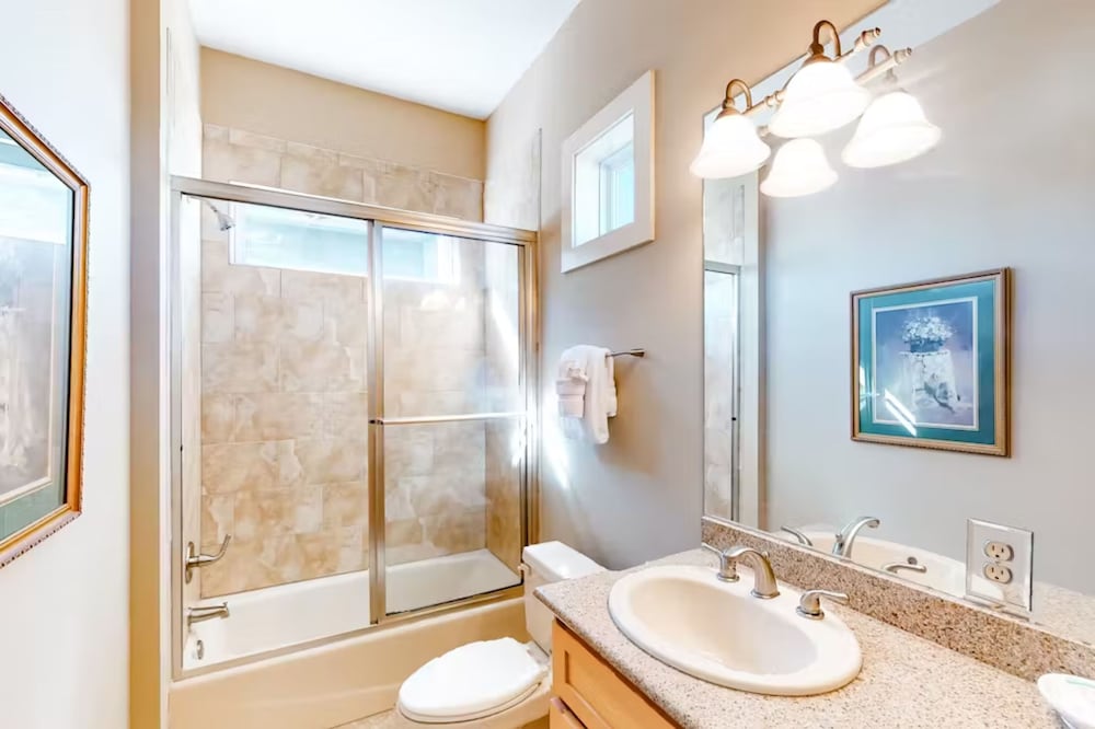 Serenity by the Sea! 4BR Retreat, Sleeps 12, Walk to Beach & Community Pool