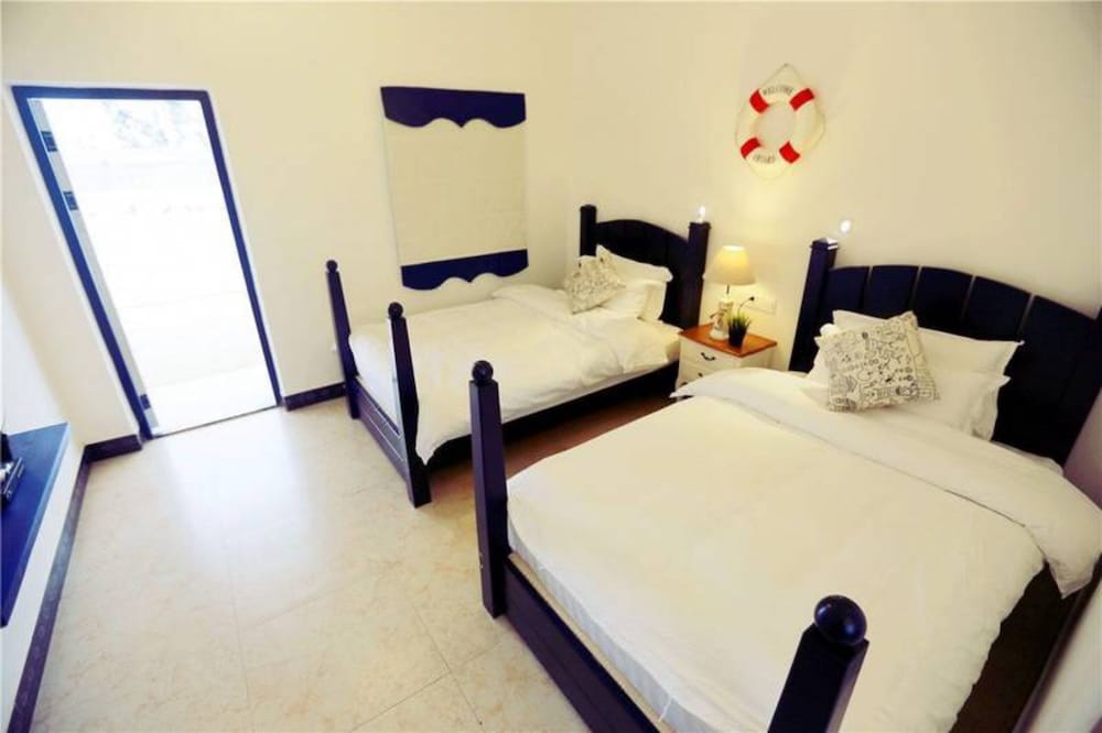 Weizhou Island Shengxiaguangnian Inn