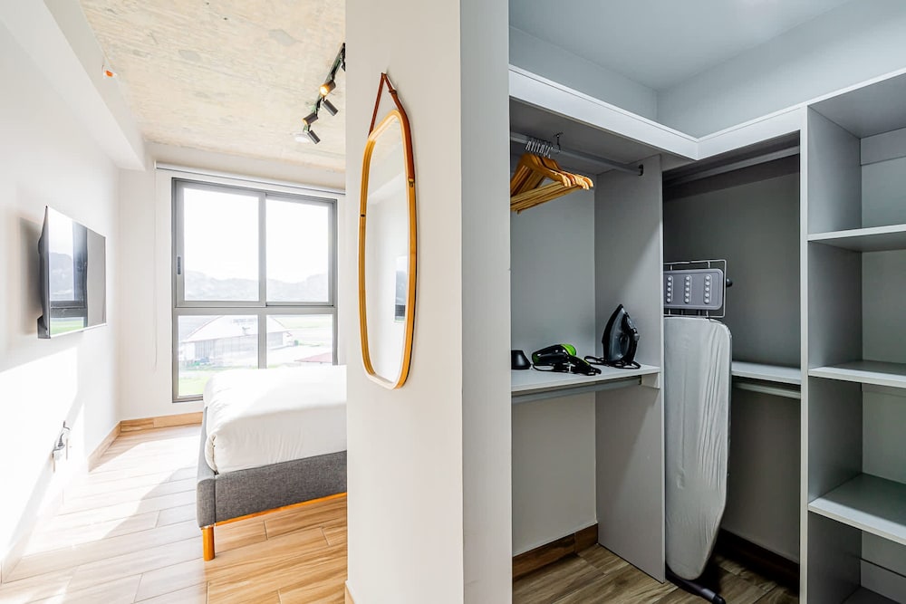 w Elegant 2BR Apartment in the Heart of Centriqo