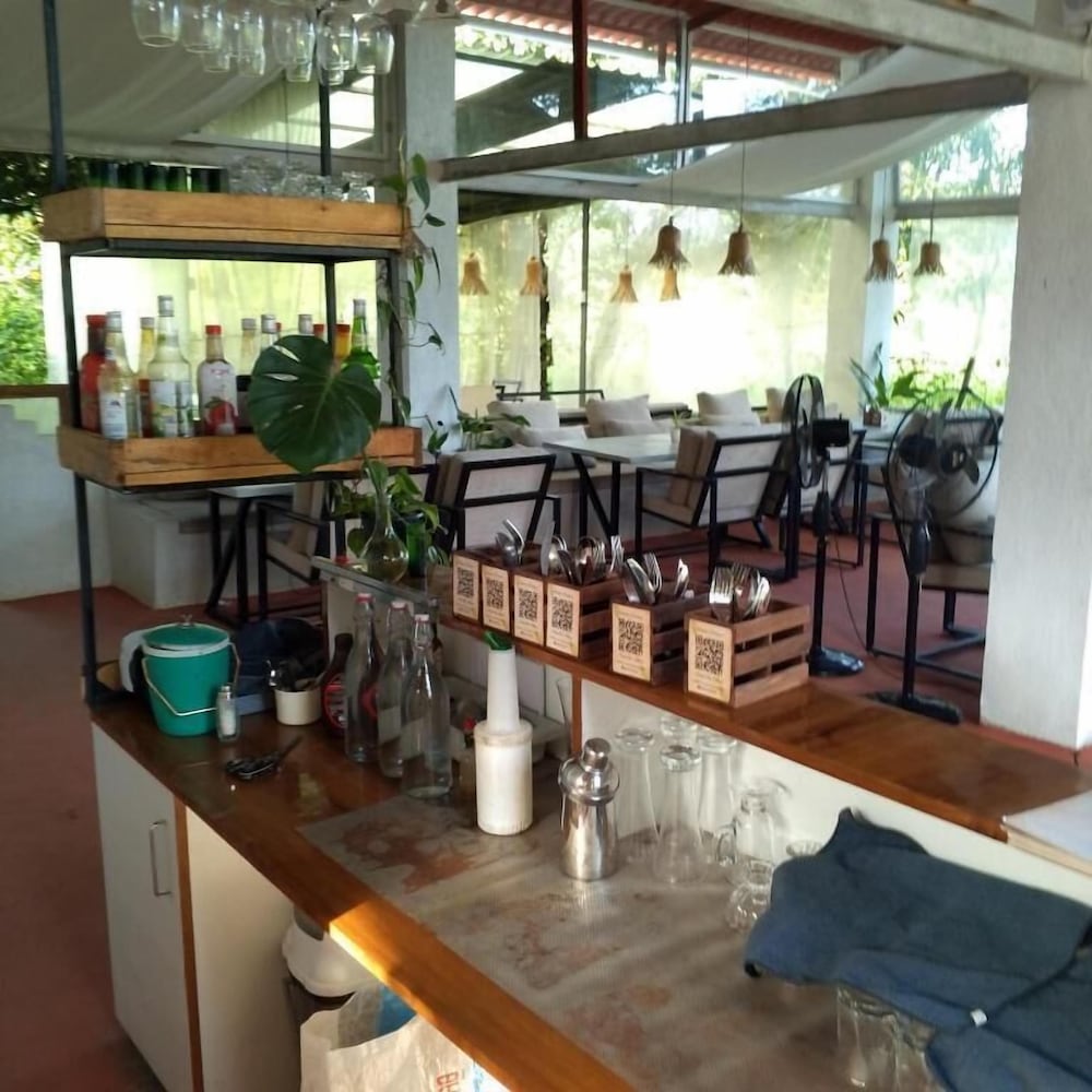 Rustic Palms - Restaurant & Cabins