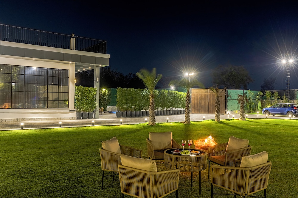 ELIVAAS Ibiza Luxe 4-BHK Farmhouse