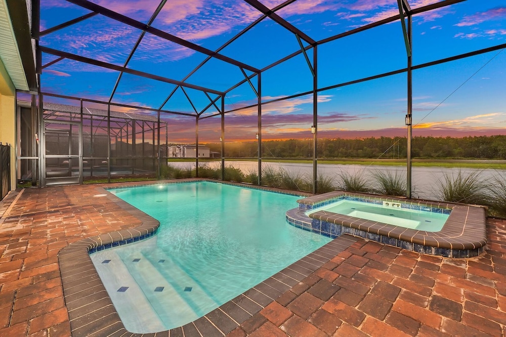 Serenity Lakeview Retreat Stunning Water Views, No Rear Neighbors, Private Pool, Game Room & Star Wars Cinema