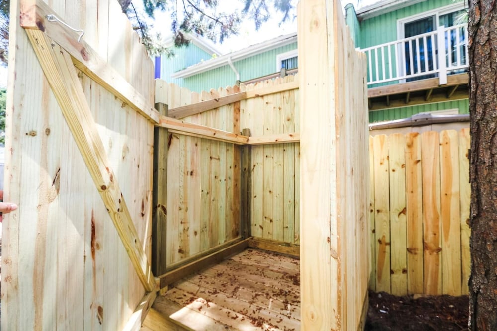 Oasis Steps From Beach Outdoor Shower and Dining view 3