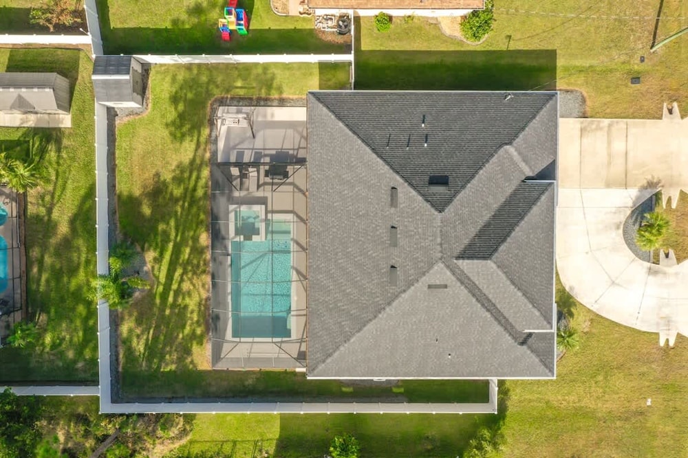 Modern 4BR Retreat Near Beach Heated Pool