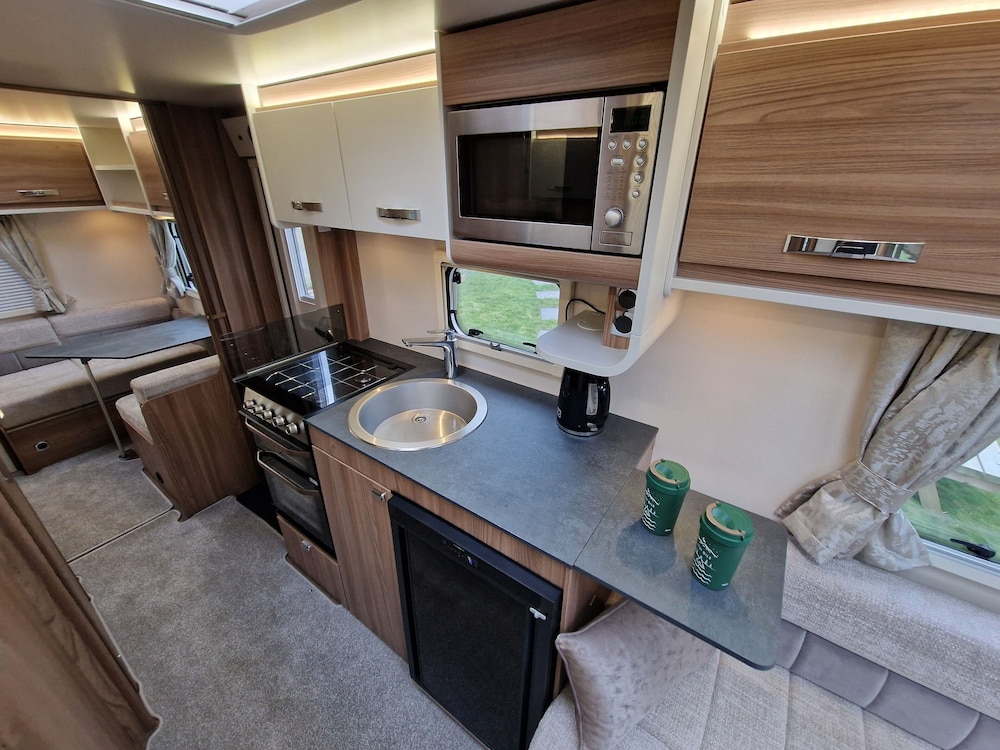 Brand new Touring Caravan Sited all Setup Ready view 5