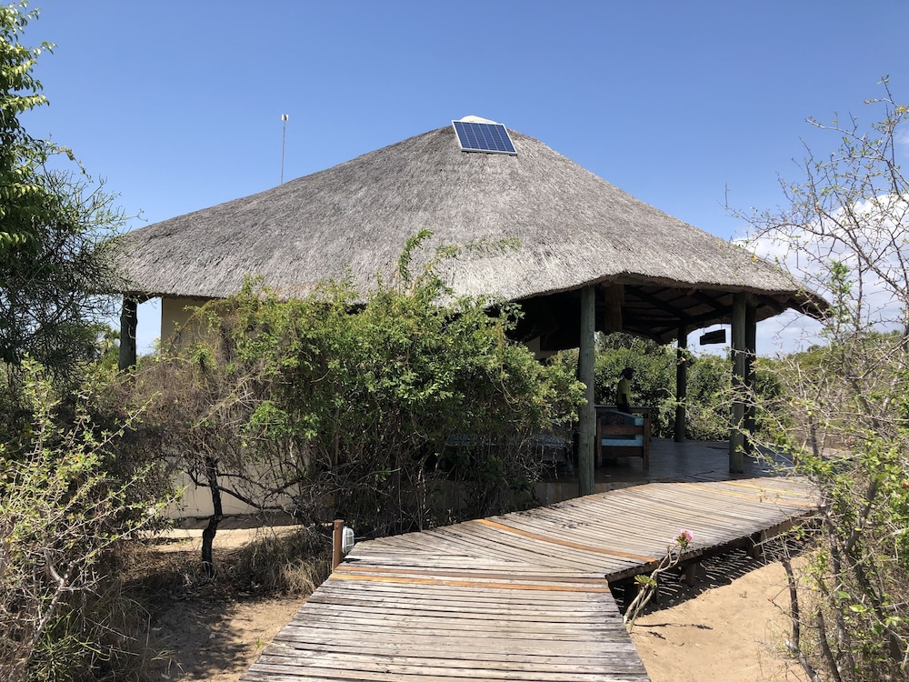 Saadani Safari Lodge - bush, river, beach view 3