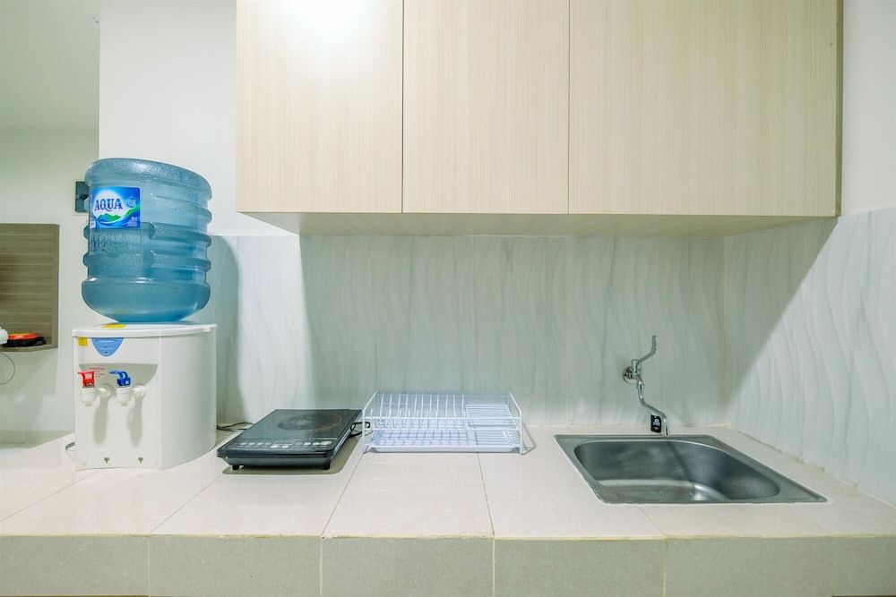 Comfort and Homey 2BR at Sentul Tower Apartment