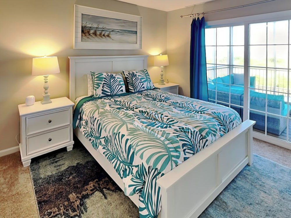 Blue Me A Wave by Topsail Realty