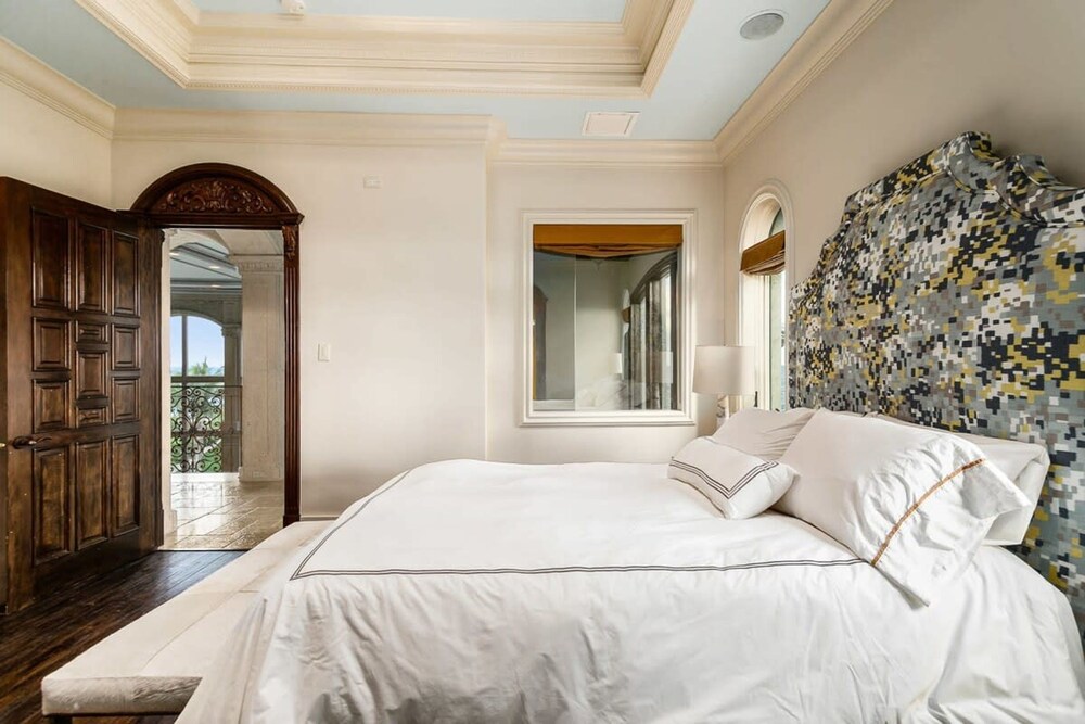 Luxurious 3-story Estate With Gym Pool Slide Private Beach and Lighthouse Views