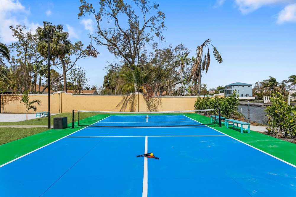 Waterfront Pool Pickleball Court Game Room