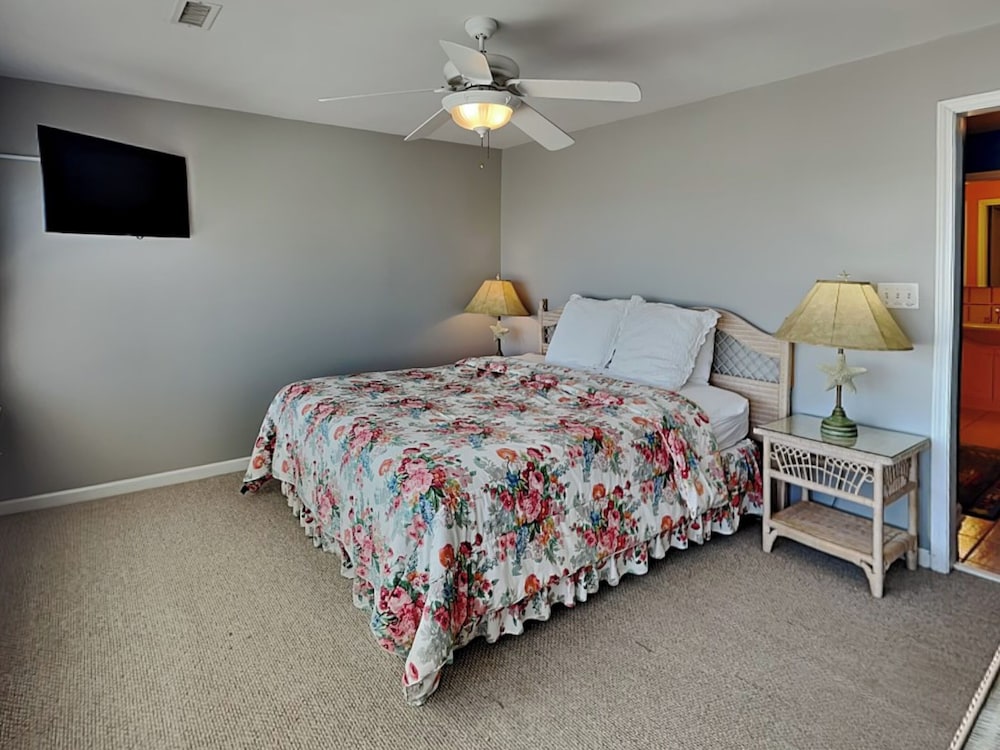 A Charm of Finches by Topsail Realty