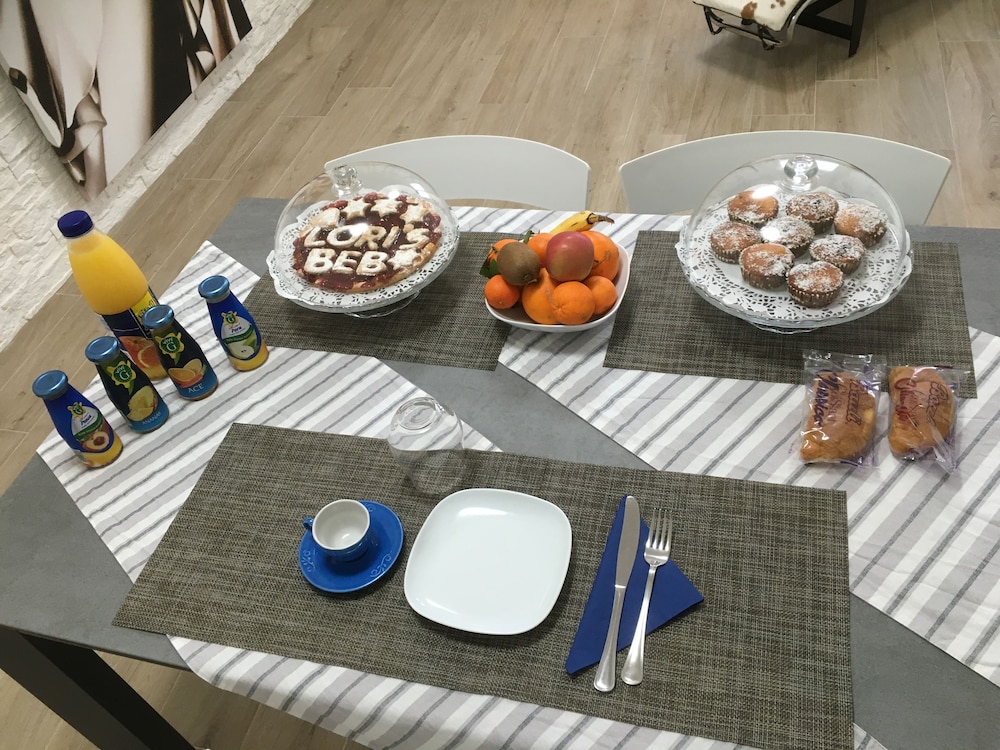 Loris B&B en Monserrato — dining