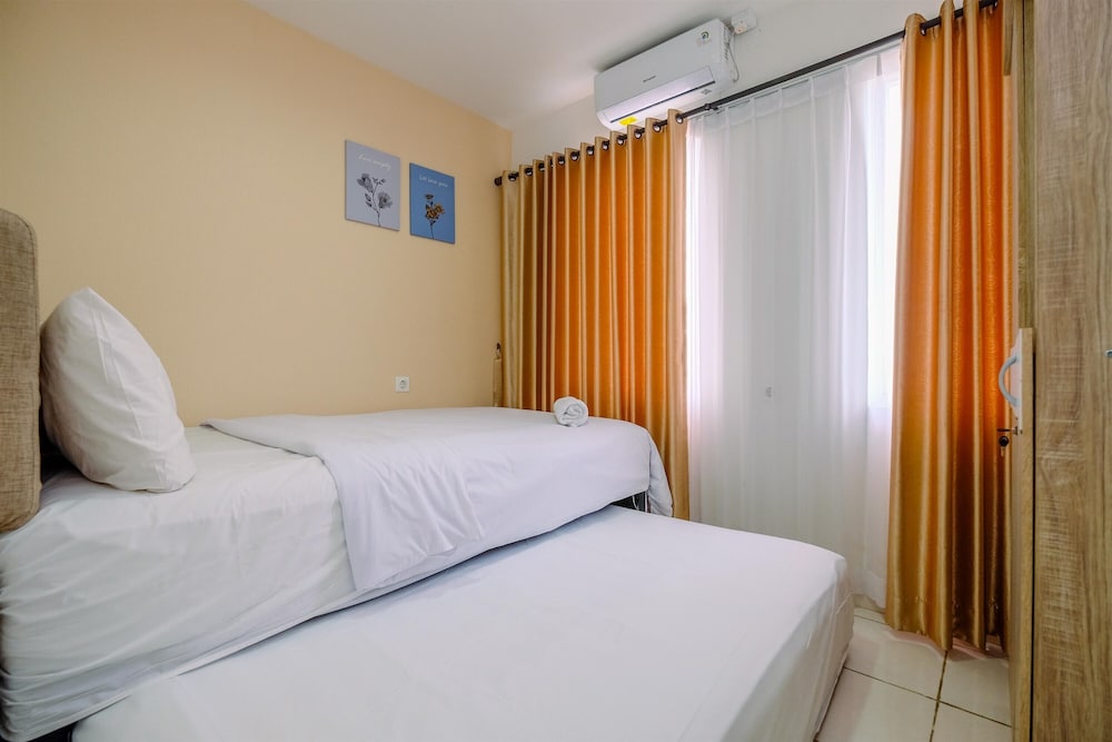 Comfort and Homey 2BR at Sentul Tower Apartment