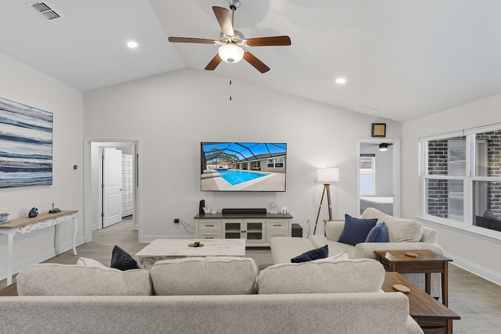 Modern 4BR Retreat Near Beach Heated Pool