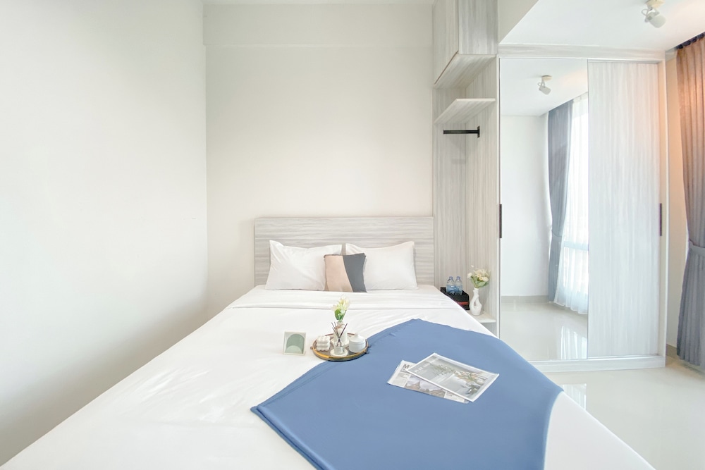 Simple White Designed Studio At Lrt City Bekasi Apartment