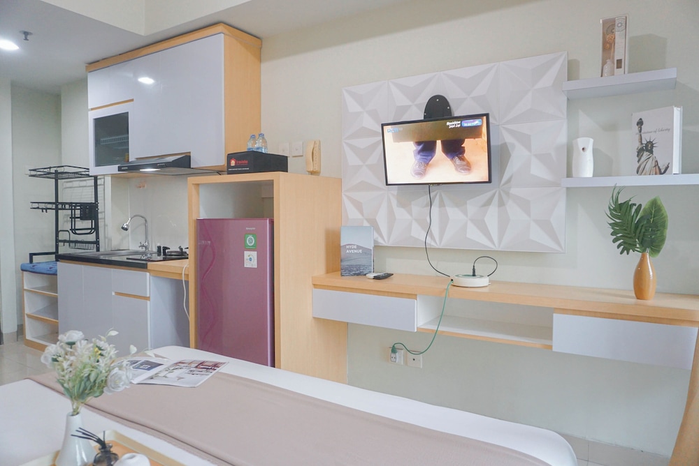 Cozy Stay and Strategic Studio Apartment at Grand Dhika City