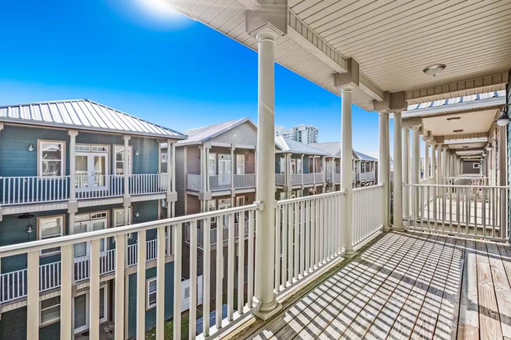 Serenity by the Sea! 4BR Retreat, Sleeps 12, Walk to Beach & Community Pool