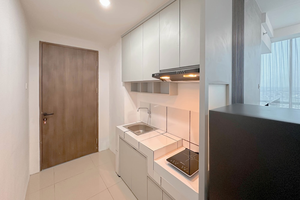Combined Grey Toned 2Br Apartment At The City Square Surabaya