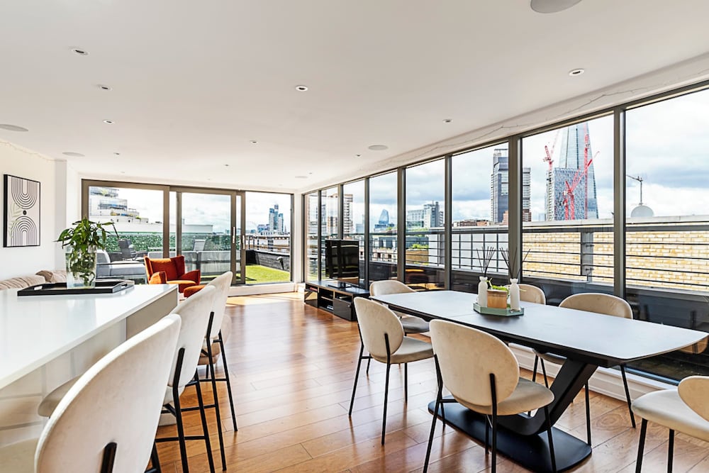 Modern Haven With Terrace View & Urban Charm