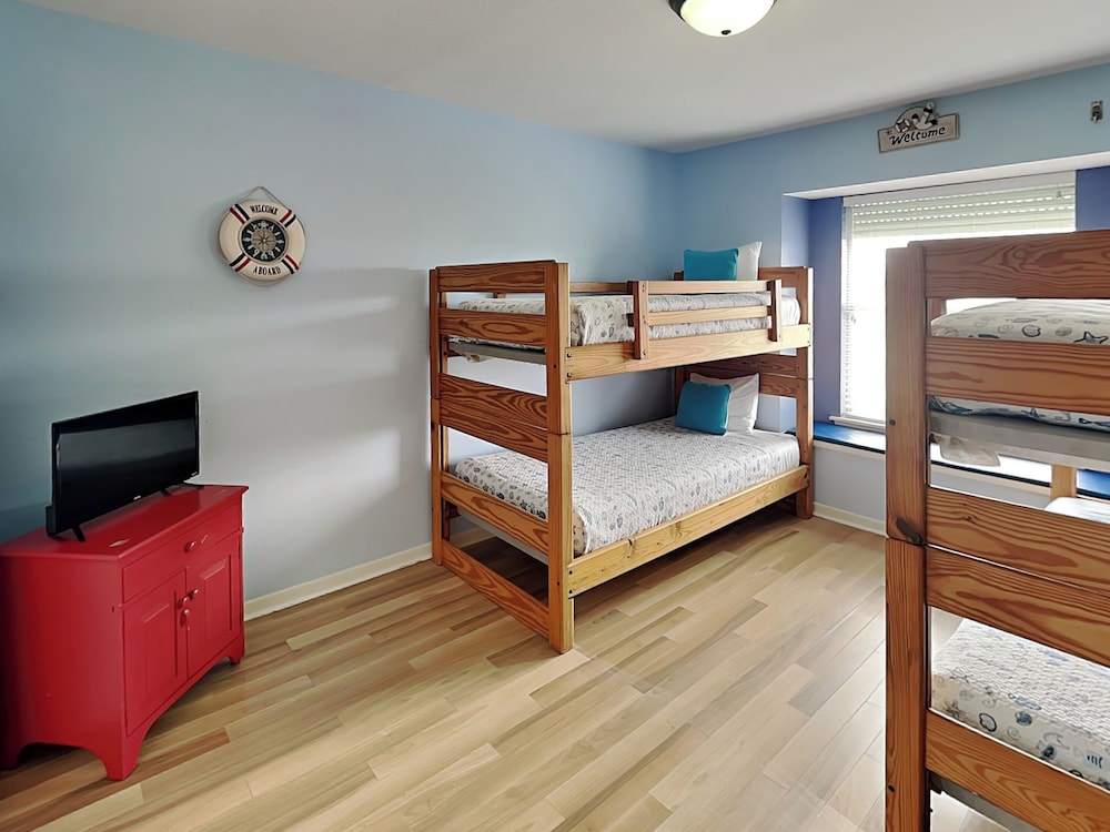 Whispering Sands Beachfront by Ryson Vacation Rentals