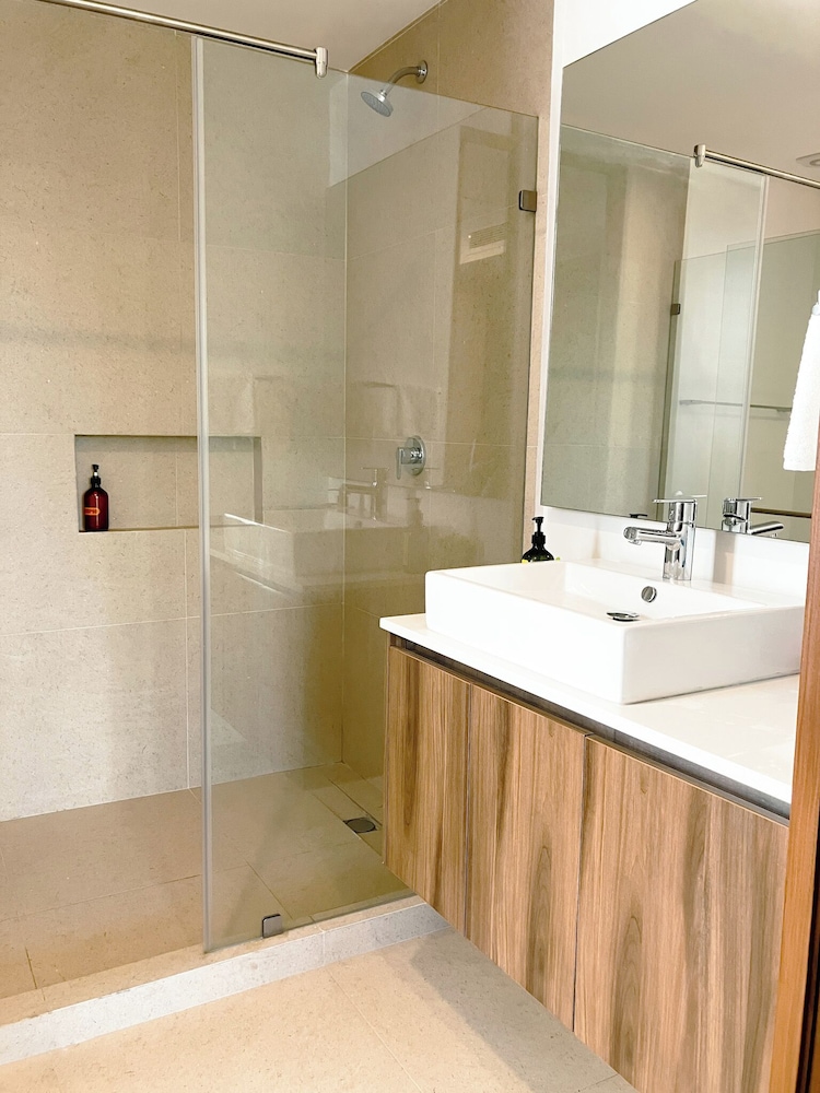 Stylish Playacar Condos w Balcony & Pool