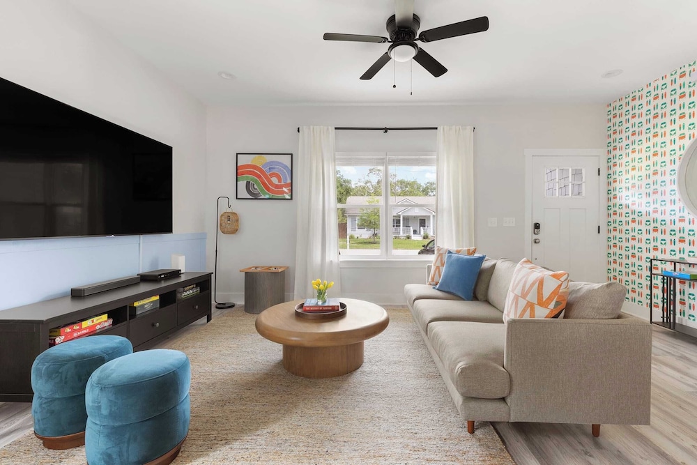 Playfully Designed Home + Hot Tub, Fire Pit & Game Room Blue Hour by Avantstay