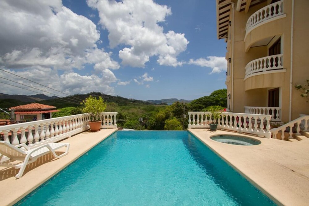 Birds-eye view of the ocean in nicely priced unit on top floor in Flamingo view 3