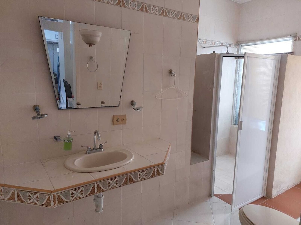 Room in Apartment - Cozy Mérida Retreat With Pool & Garden View