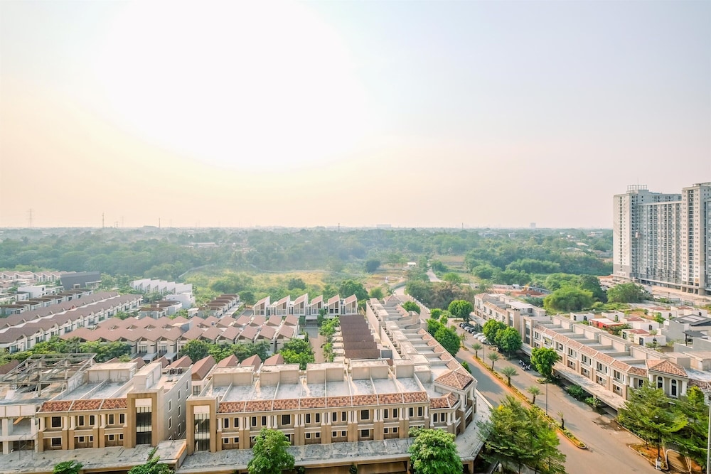Homey and Modern 2BR at Podomoro Golf View Apartment