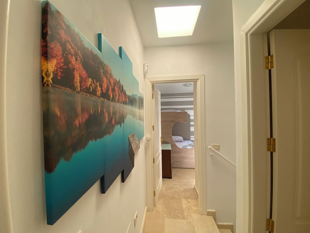 New Renovated Family Home Above Swimming Pool!