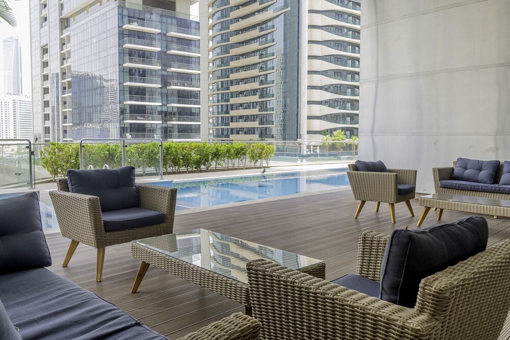 Elegant Apartment Amidst Vibrant Area with Balcony