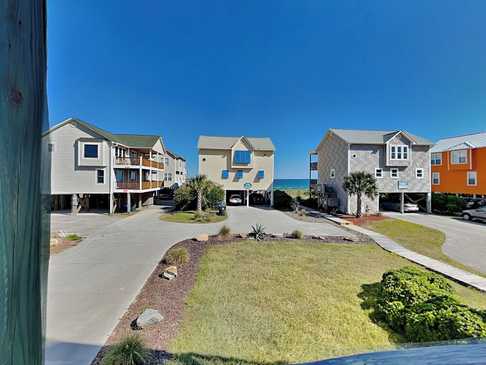 Song Of The Sea by Topsail Realty