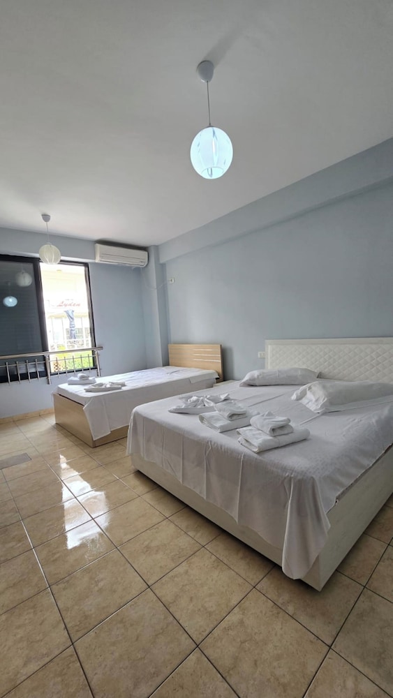 Tirent Apartment - Cozy Bedrooms Stay by Golem Beach.