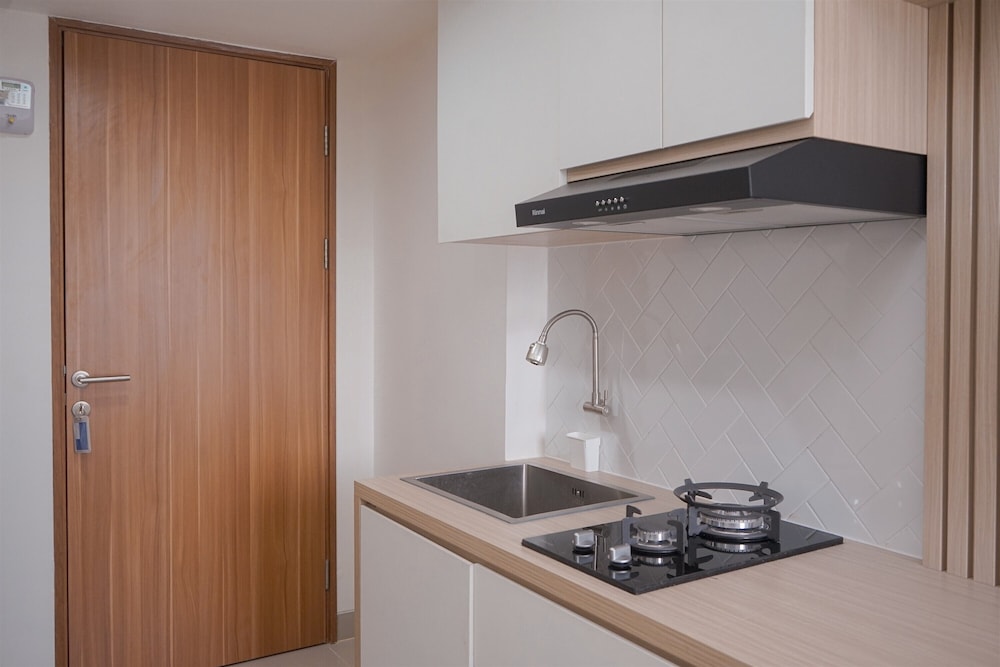Minimalist And Warm Studio Room At Cisauk Point Apartment