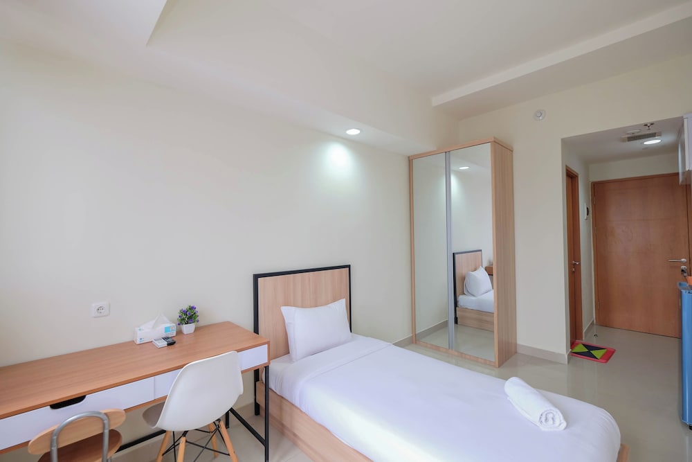 Warm And Cozy Studio At Evenciio Margonda Apartment