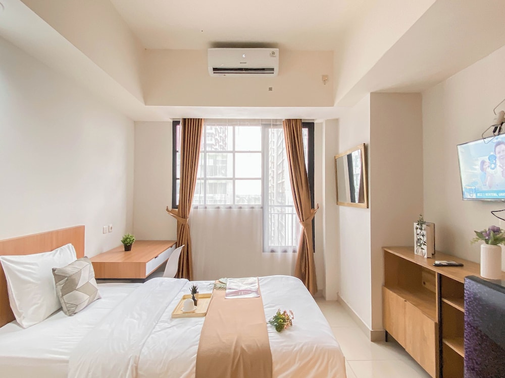 Cream Tone Studio At Evenciio Margonda Apartment