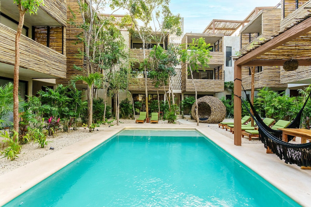 Eco-sustainable Luxury Between Beach Hotspots & Tulum Town by Stella Rentals