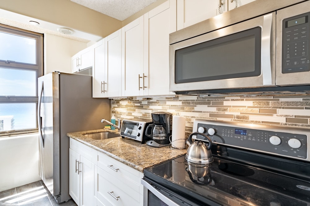 Waikiki Banyan Condo Located One Block From Waikiki Beach! by Koko Resort Vacation Rentals