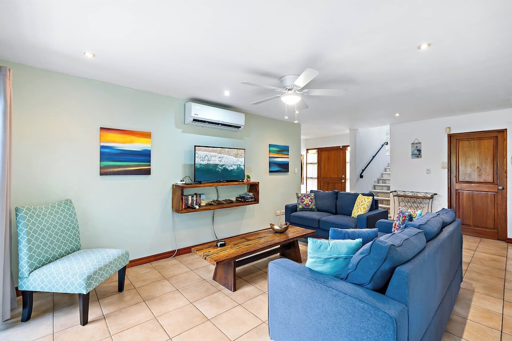 Inviting Home with Colorful Decor and Private Backyard Oasis with a Swimming Pool & Shaded Terrace