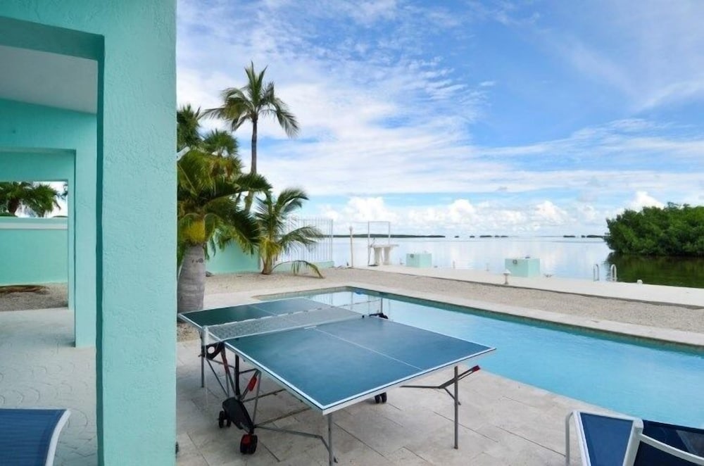 Waterfront Home With Swimming Pool 4 Bedroom Home by RedAwning view 3