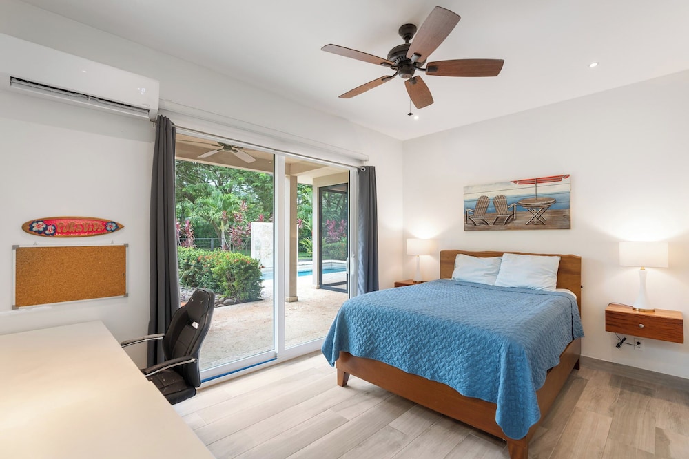 Beautiful home in a gated Neighborhood, Walking Distance to Beach with Garden