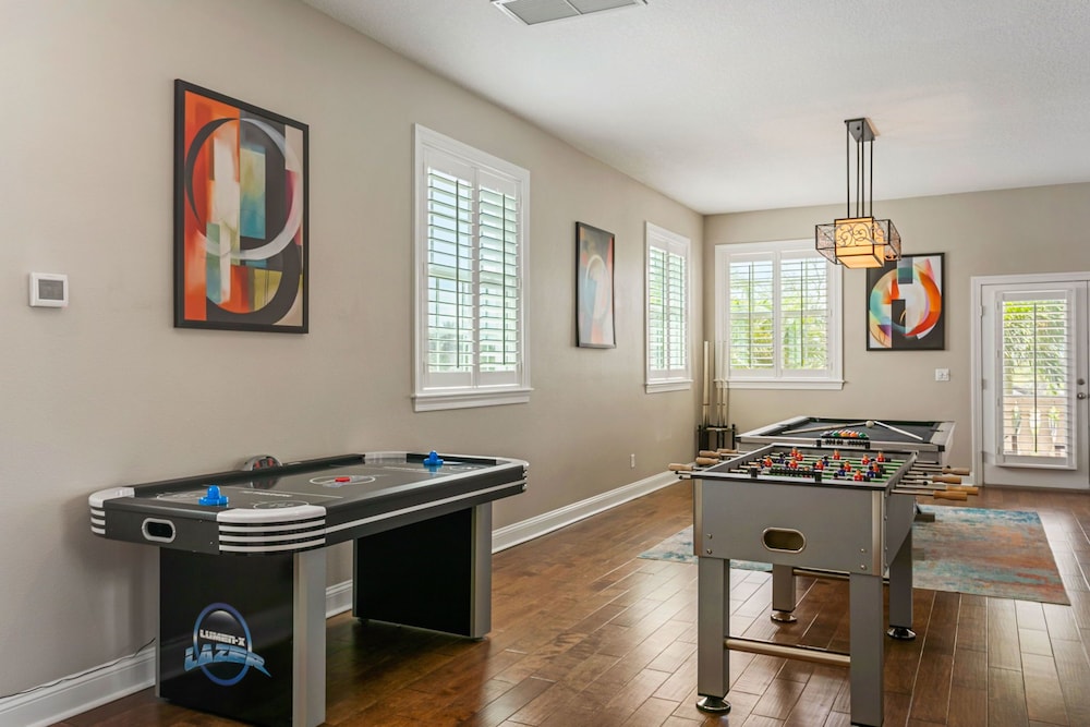 Waterfront Pool Pickleball Court Game Room