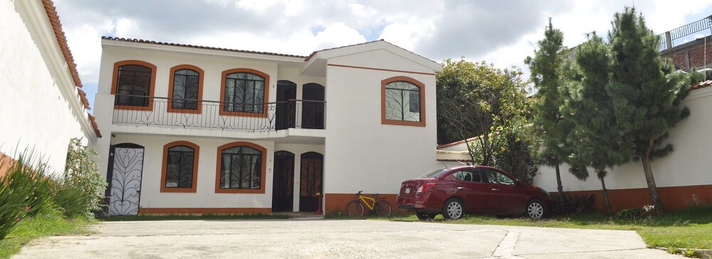 Hotel Suites Carmelita - Image 1