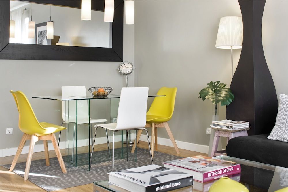 Hotel Prime Apartments White and Yellow - Image 1