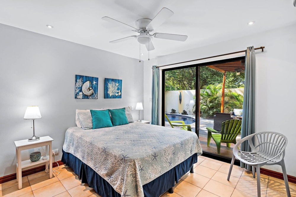 Inviting Home with Colorful Decor and Private Backyard Oasis with a Swimming Pool & Shaded Terrace