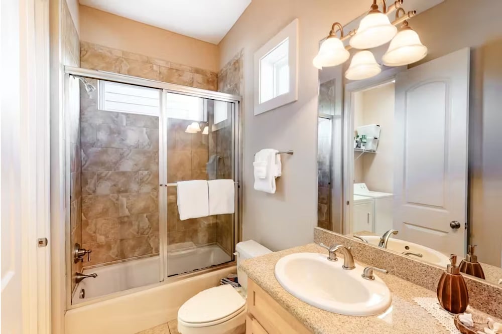 Serenity by the Sea! 4BR Retreat, Sleeps 12, Walk to Beach & Community Pool