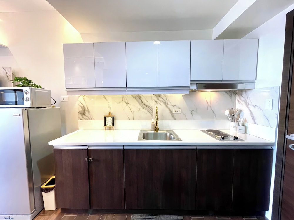 Luxurious White & Gold Haven in Makati