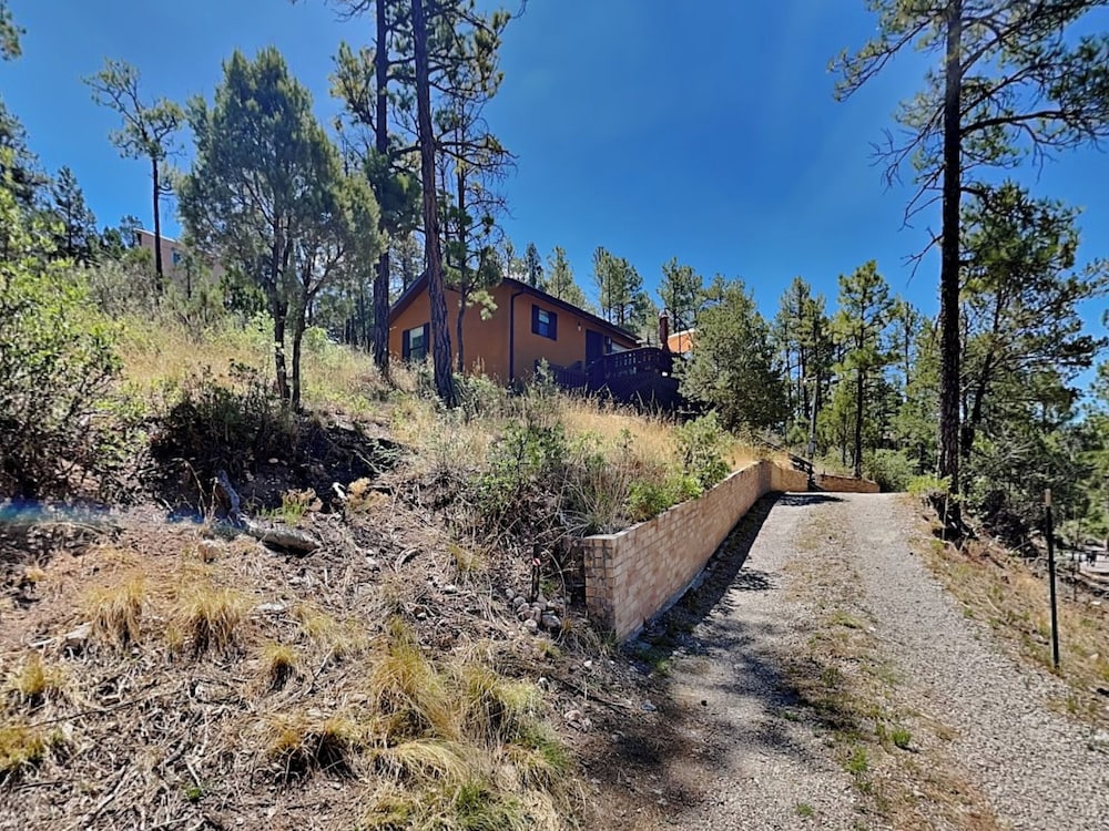 Knotty Pines Cabin by Ruidoso Vacation Rentals