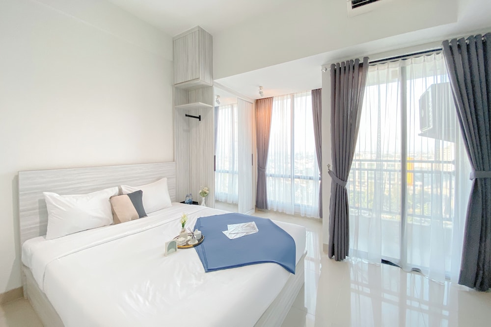 Simple White Designed Studio At Lrt City Bekasi Apartment